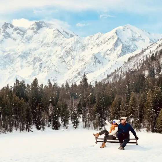 Guests enjoying the scenic views of Fairy Meadows, Pakistan