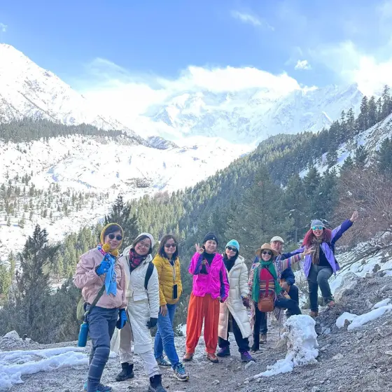 Guests enjoying the scenic views of Fairy Meadows, Pakistan