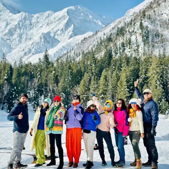 Guests enjoying the scenic views of Fairy Meadows, Pakistan