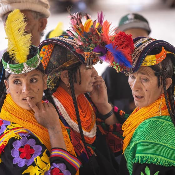 Kalash people in traditional clothing in Chitral, Pakistan