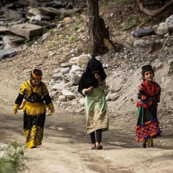 Kalash people in traditional clothing in Chitral, Pakistan