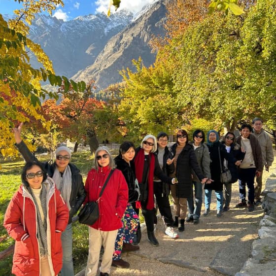 Skardu tour guests enjoying the beautiful mountain scenery
