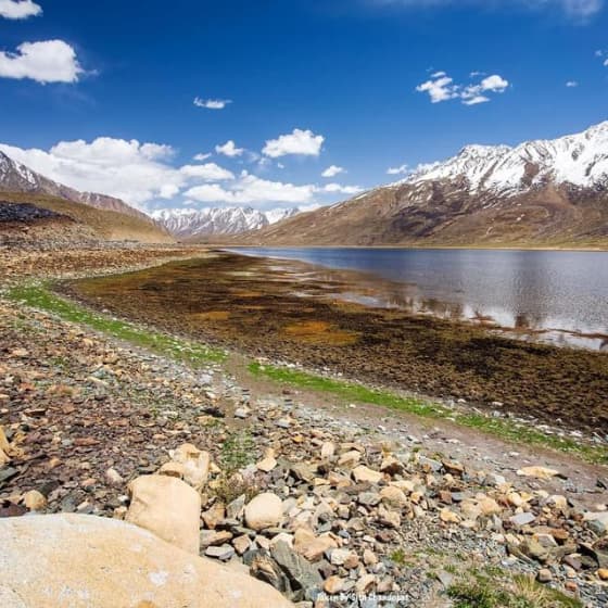 Skardu tour guests enjoying the beautiful mountain scenery