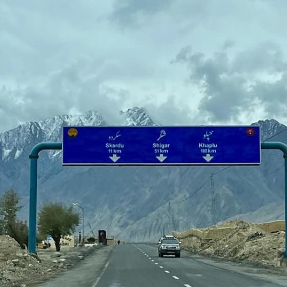 Skardu tour guests enjoying the beautiful mountain scenery