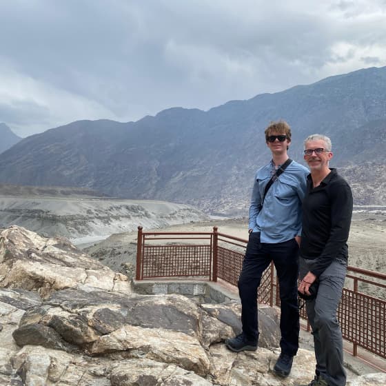Skardu tour guests enjoying the beautiful mountain scenery